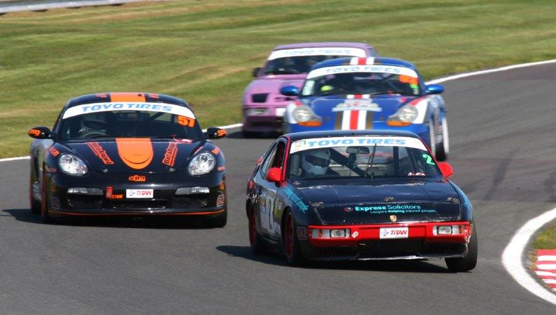 Race 2 - Double Class B winner Simon Hawksley about to be overtaken by the Boxsters of Gary Duckman and Garry Lawrence motorsportdays.com